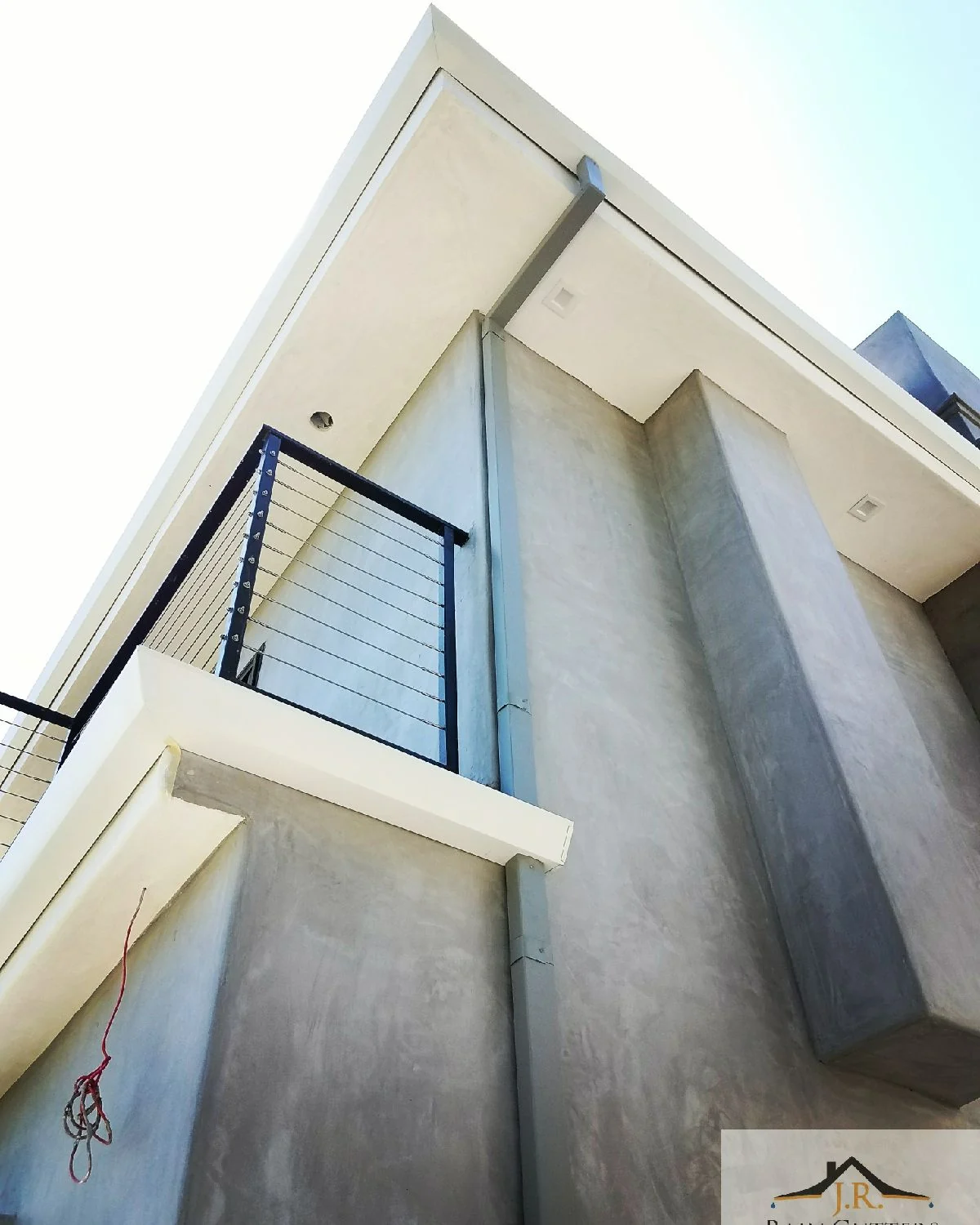 Rain gutter installation on a contemporary home